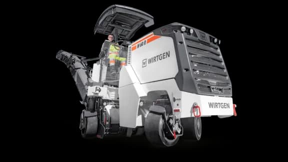 Wirtgen W 60 R small-class cold milling machine, featuring a compact tracked chassis, 600 mm milling drum, and conveyor system designed for precision milling in tight or narrow work areas.