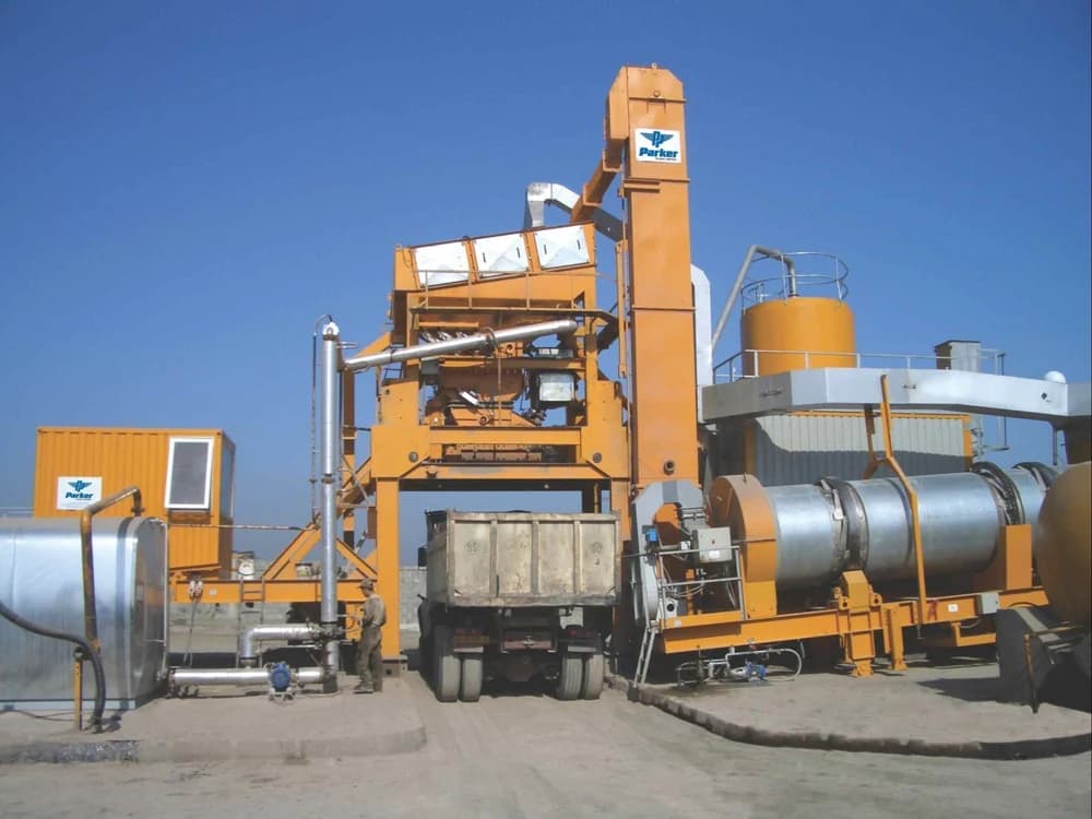 The Parker StarMix 180 TPH is a high-capacity, fully automatic asphalt batch mix plant featuring a multi-tier tower design with drying drum, mixing tower, and bitumen/filler storage, engineered for large-scale, high-productivity hot-mix asphalt production.
