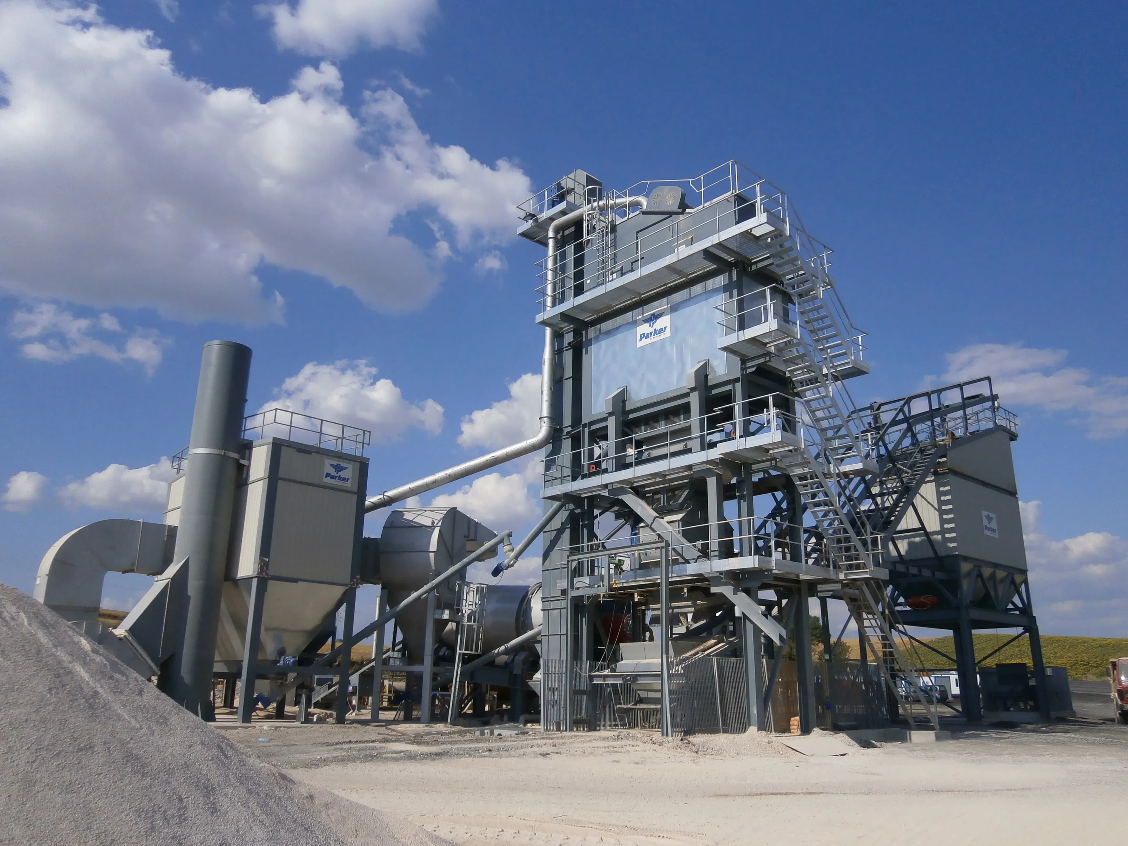 The Parker StarMix 220 TPH is a top-tier, fully automatic asphalt batch mix plant featuring a multi-tier tower design with drying drum, high-capacity mixing tower, and bitumen/filler storage, engineered for very high-volume, high-precision hot-mix asphalt production on major infrastructure projects.