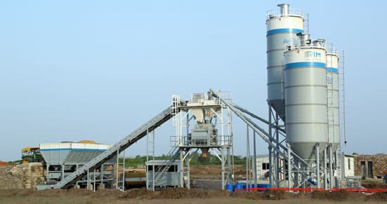 Apollo ATP inline concrete batching plant series lineup spanning 30 to 120 m³/hr, with the 90 m³/hr model featuring a robust mixing tower, twin aggregate storage bins, and integrated cement silo for high-volume, consistent concrete output.