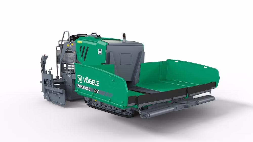 A promotional shot of the SUPER 800-5 P mini paver on a job site, showcasing its compact frame and screed unit ready for small-scale asphalt paving work