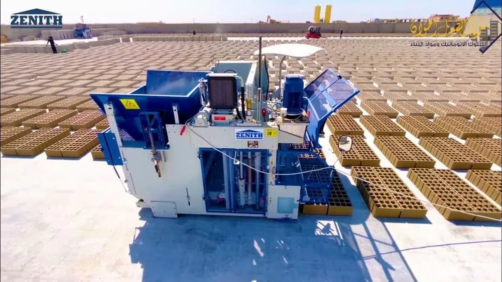 Apollo Zenith ZN 1000 fully automatic concrete block making machine, featuring its integrated safety systems, hydraulic pressing station, and high-capacity conveyor built for large-scale block and paver production.