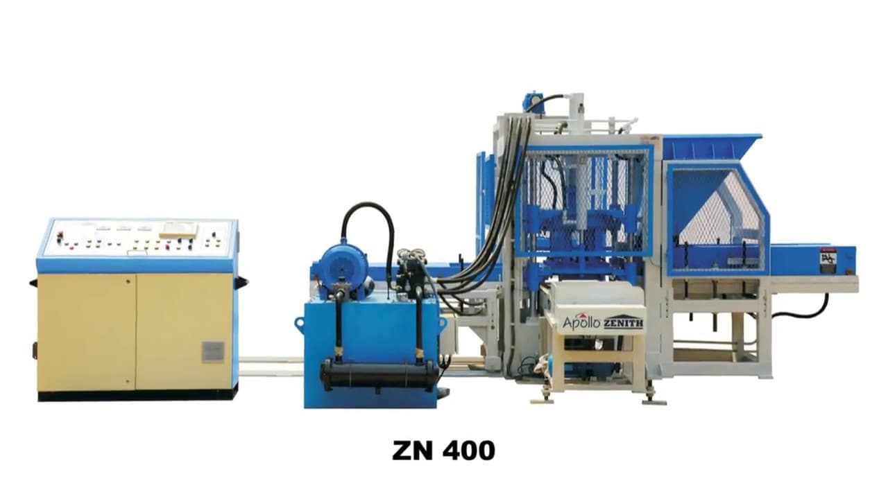 Apollo Zenith ZN 400 fully automatic block making machine, featuring its hydraulic pressing unit, mould station, and conveyor system designed for high-volume production of concrete blocks and pavers.